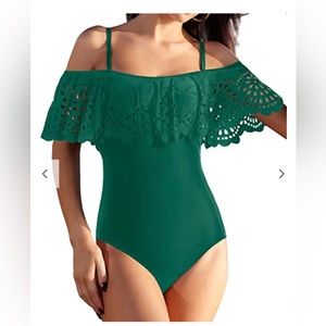 One piece green ruffled bathing suit